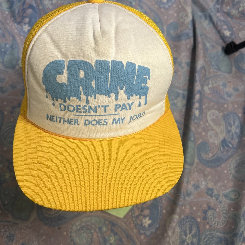 Vintage Crime Doesnt Pay Neither Does My Job Trucker Hat Yellow White Snapback